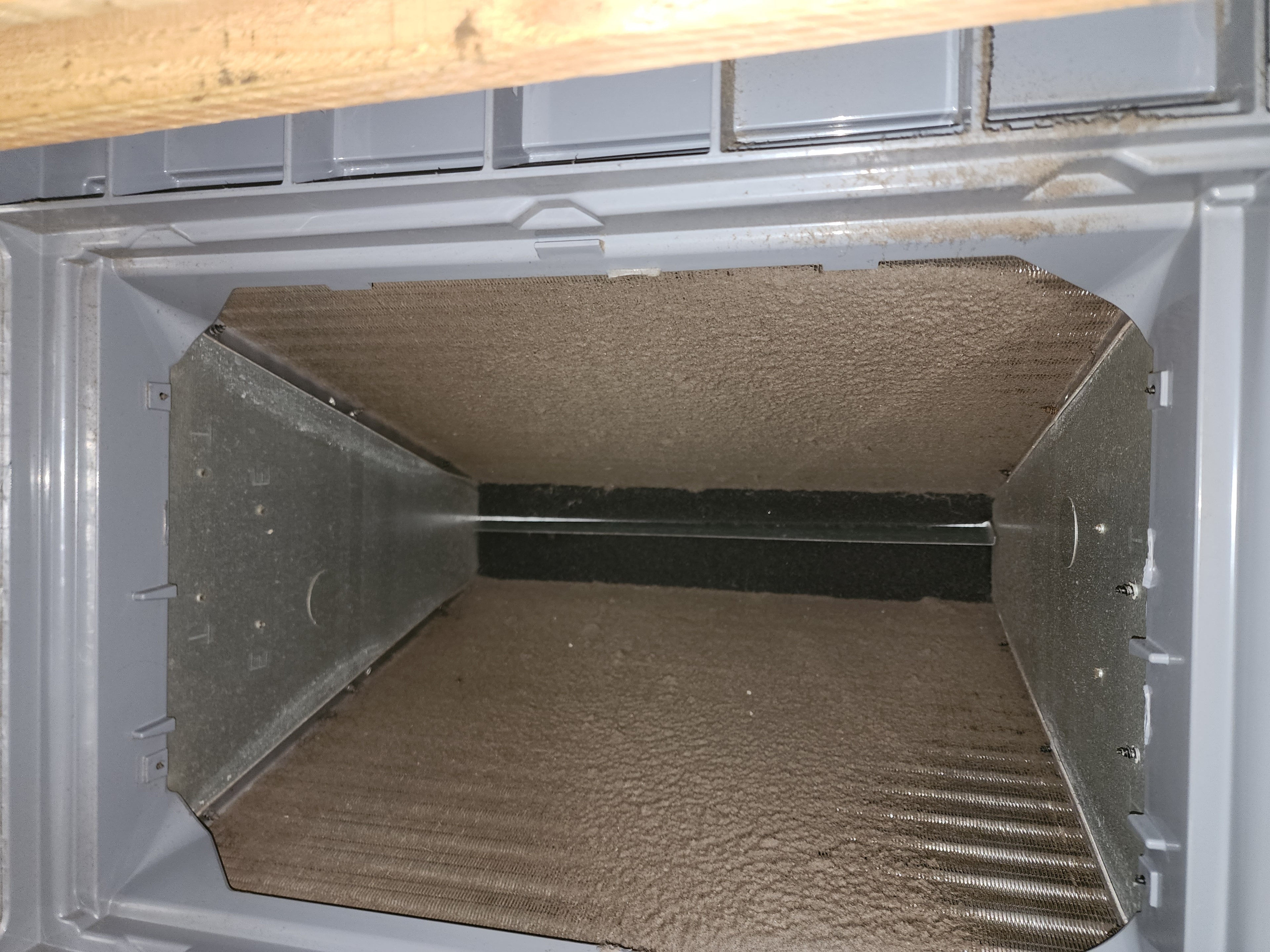Clogged evaporator coil before maintenance cleaning — Garris Air