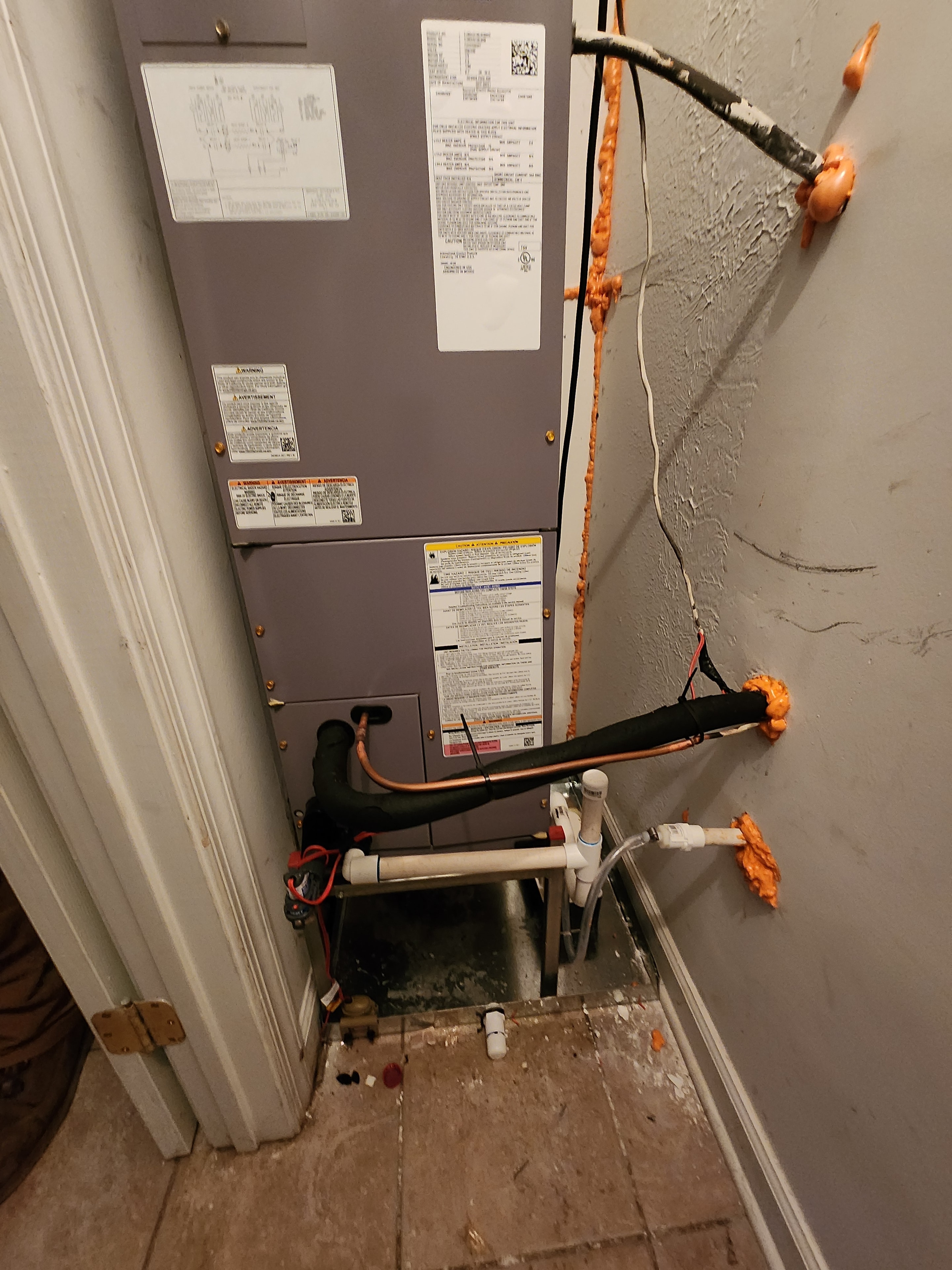 HVAC system installation with exposed wiring — Garris Air job